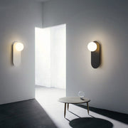 Nordic Minimalist Globe Wall Sconce with Decorative Oval Backplate