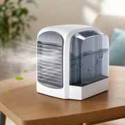 Portable evaporative air cooler with oscillation