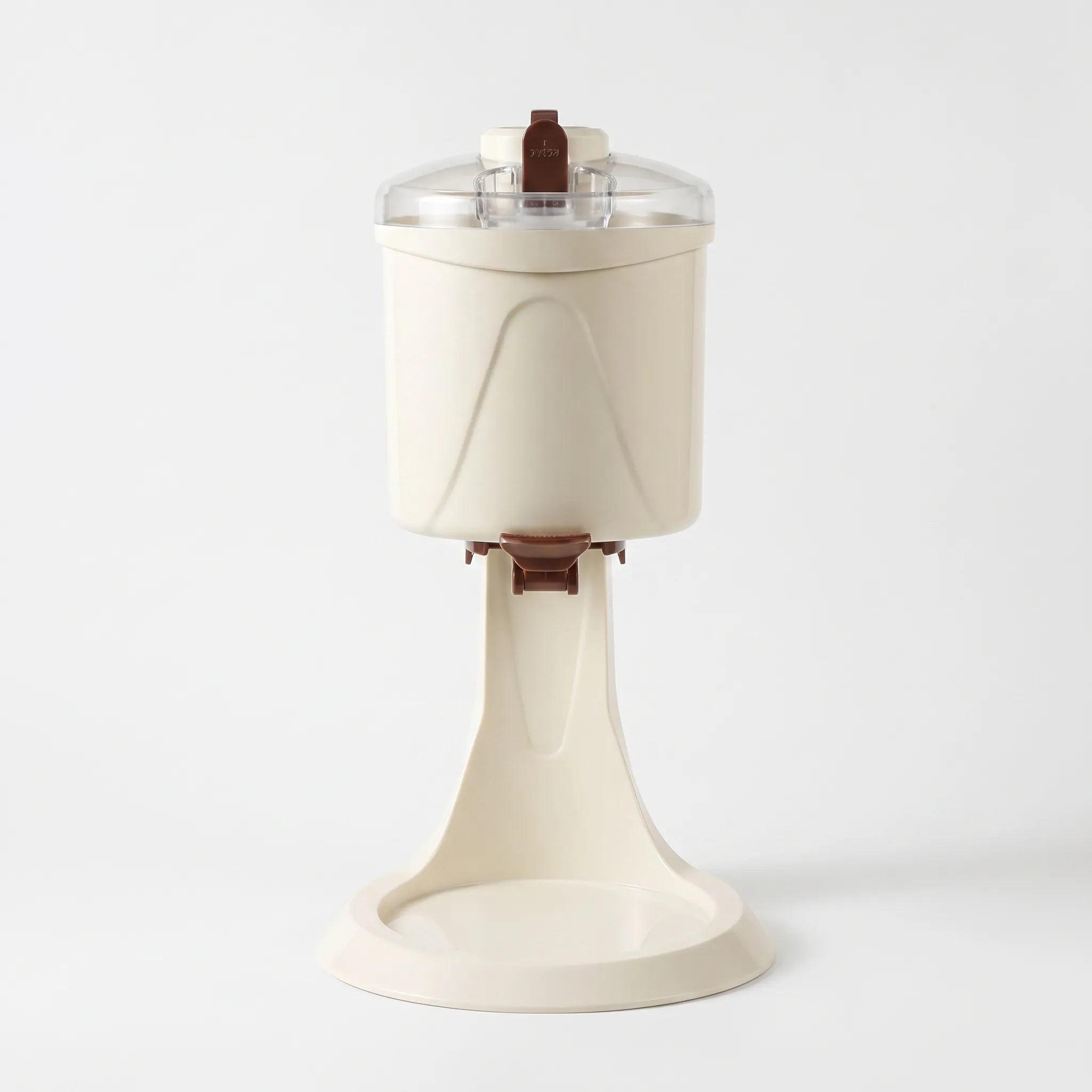 Soft serve machine dispensing ice cream into a cone