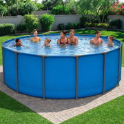 Round steel frame above ground pool set up in a sunny backyard