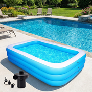 Blue rectangular inflatable family swimming pool in a backyard