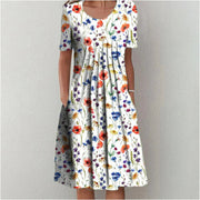 Charming Floral Midi Dress for Women – Relaxed Short Sleeve Summer Dress with Pockets & Flowing A-Line Skirt